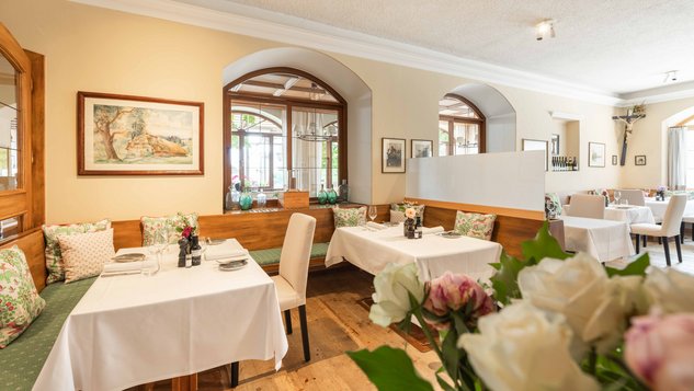 You can see different wines in the background a green garden